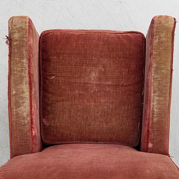 A rocking chair,  1930s.