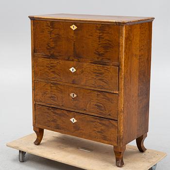 A birch-veneered dresser, second half of the 19th century.