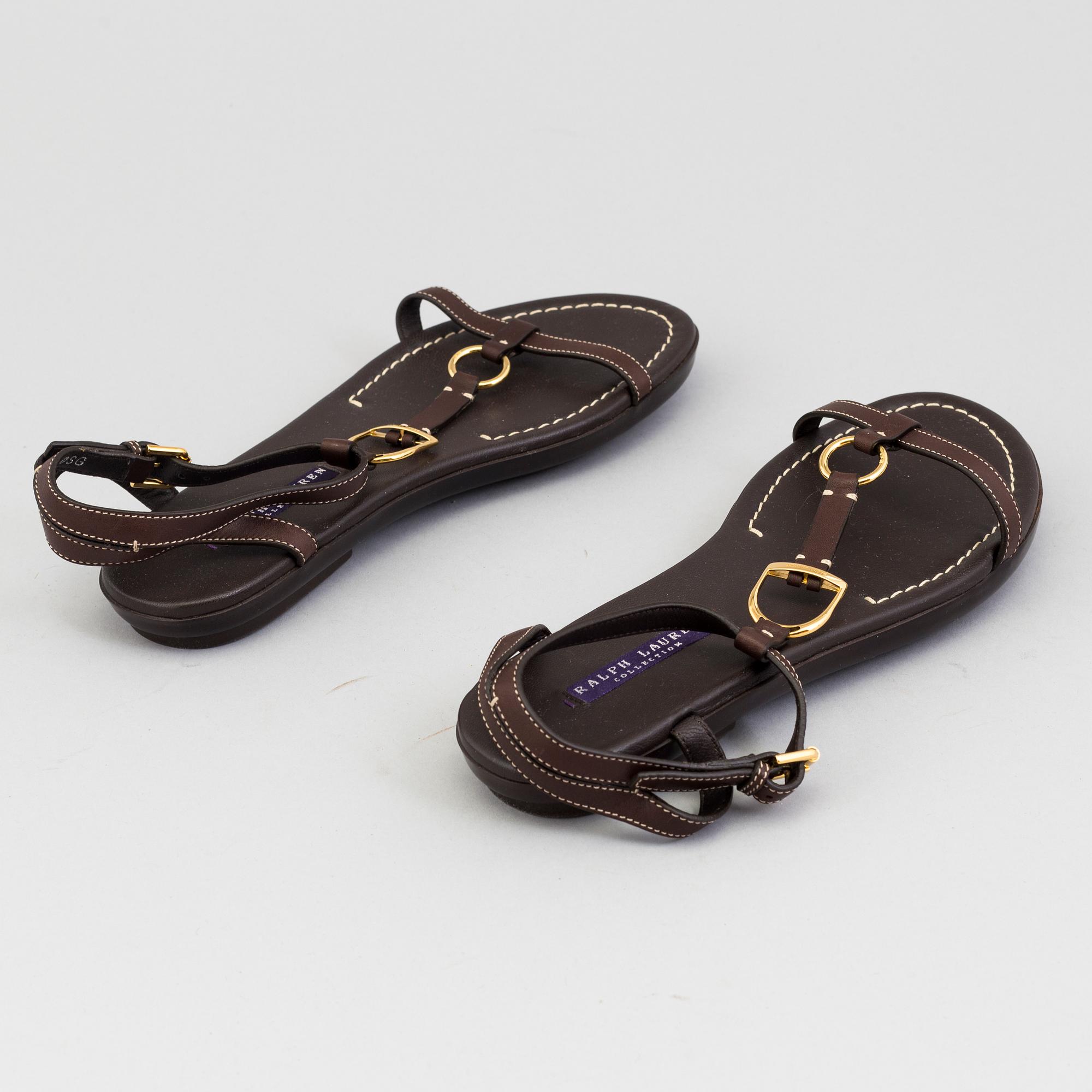 A pair of darkbrown leather sandals by Ralph Lauren.