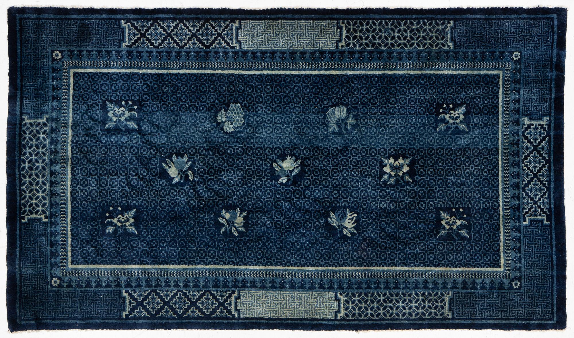 An antique Baotou carpet, north China, c. 257 x 155 cm.