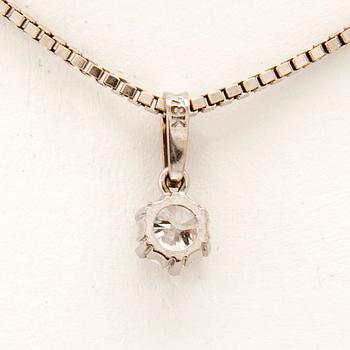 An 18K white gold necklace set with a round brilliant-cut diamond.