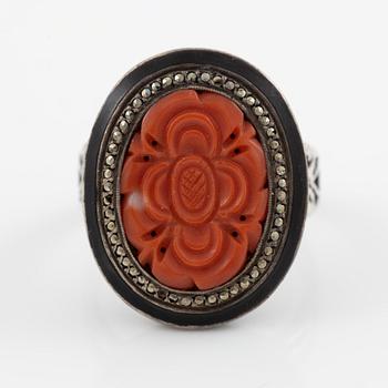 Silver ring with coral and marcasites and with black details.