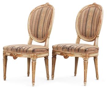 A pair of Gustavian late 18th century chairs.