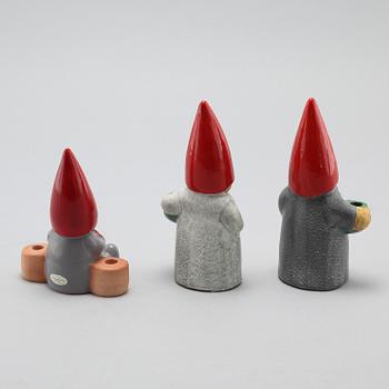 Three ceramic candlesticks by Lisa Larson for Gustavsberg, partly signed.
