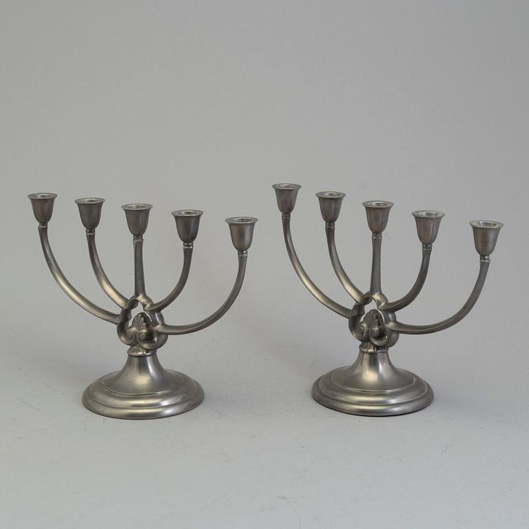 A pair of pewter candelabra from GAB, first half of the 20th century.