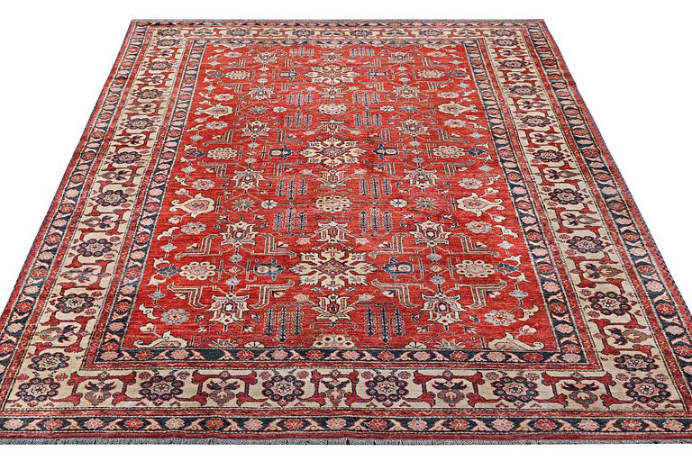 A Kazak carpet, c. 325 x 240 cm.