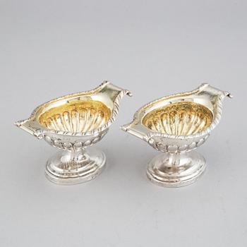 A pair of 19th century parcel-gilt silver salt-cellars, unidentified marks.