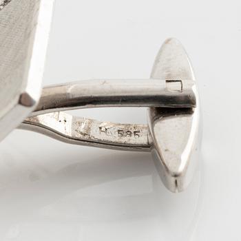Cufflinks, a pair, white gold with brilliant-cut diamonds.