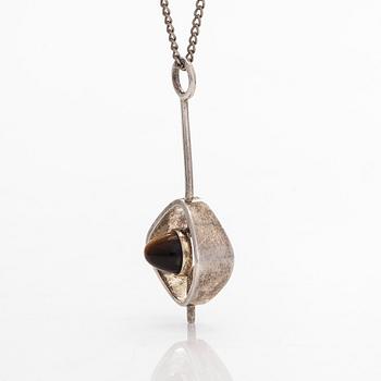 Elis Kauppi, a silver and tiger's eye pendant, Kupittaan Kulta, Turku, with silver chain.