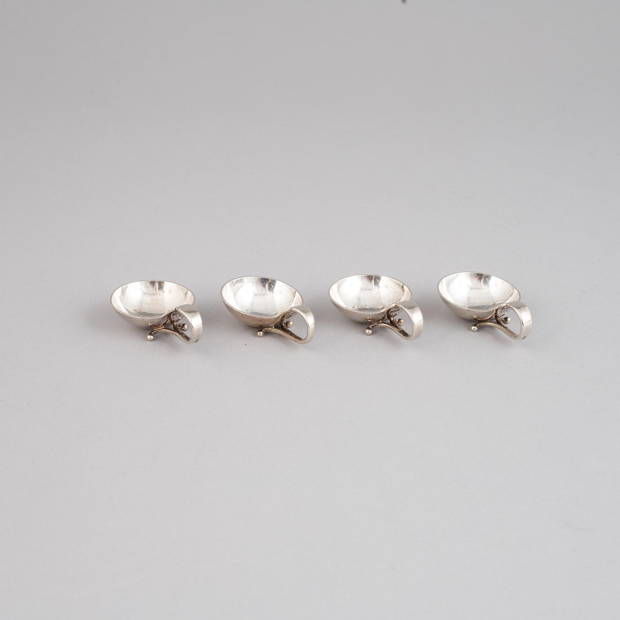 Four silver salt cellars from Georg Jensen.