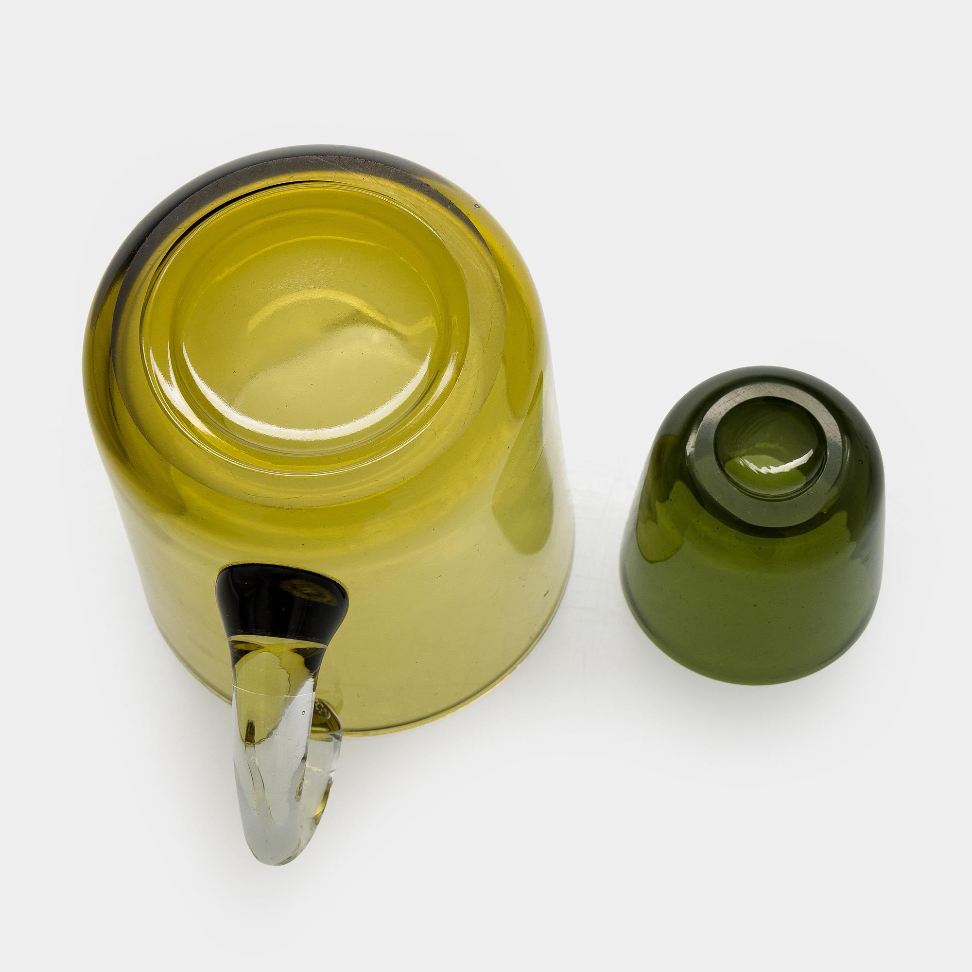 Kaj Franck, a mid-20th century "5601" glass pitcher and a twelve "5023" glasses, Nuutajärvi, Finland.