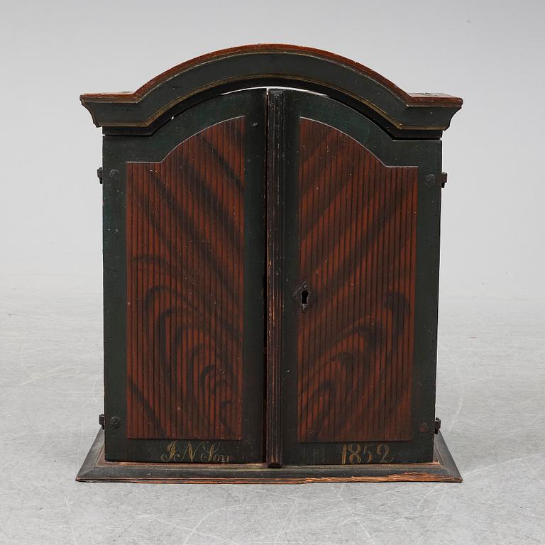 A painted pine wall cabinet, 19th Century.