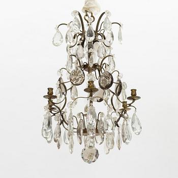 A Rococo style chandelier, mid 20th Century.