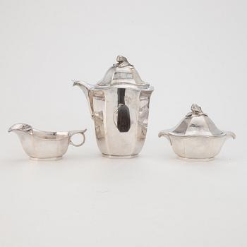 Jacob Ängman, a silver coffee pot, creamer and sugar bowl, GAB, Stockholm 1929.