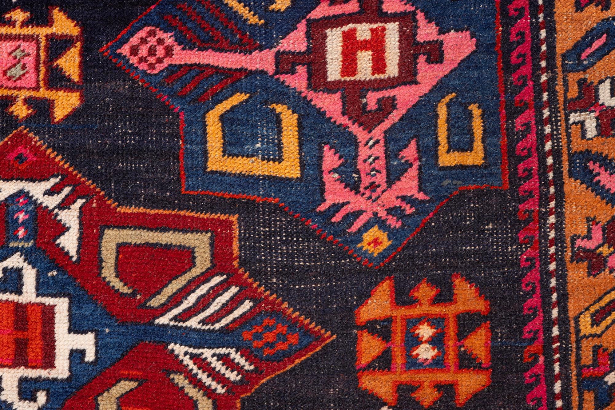 A semi-antique Anatolian runner, c. 409 x 159 cm.