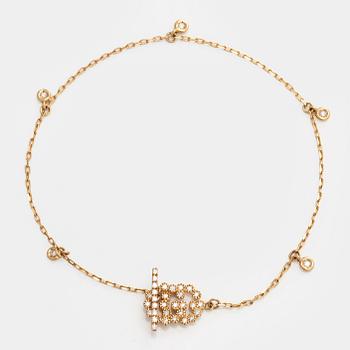 Gucci, armband, "Interlocking", 18K guld med briljantslipade diamanter.
