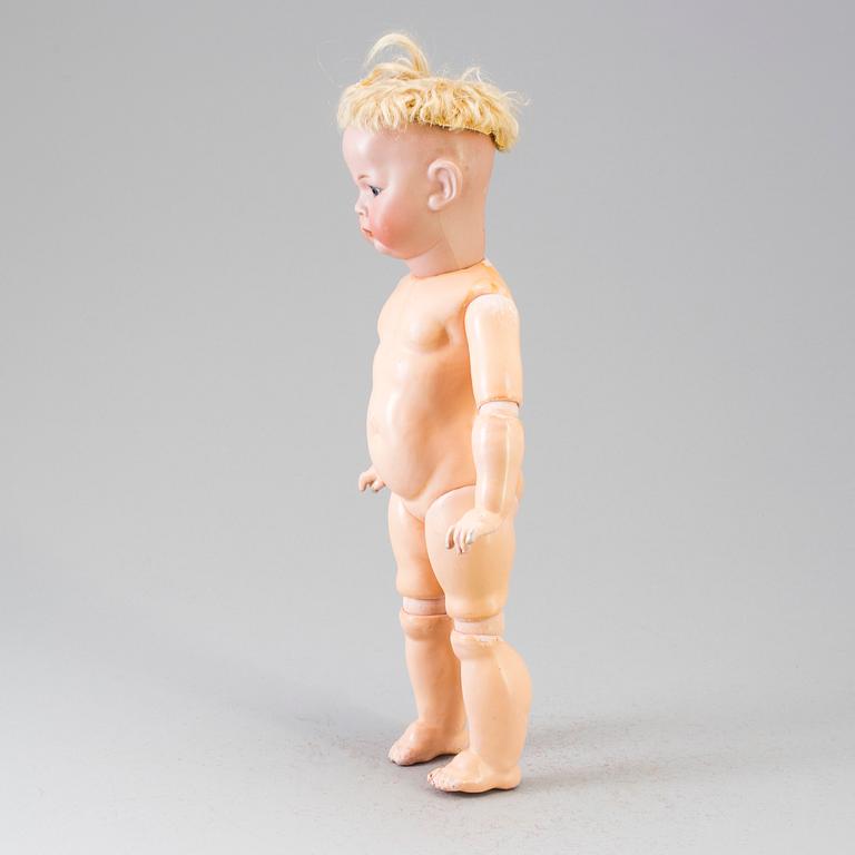 A bisque head character doll 115A by Kämmer & Reinhardt, Germany, ca 1911.