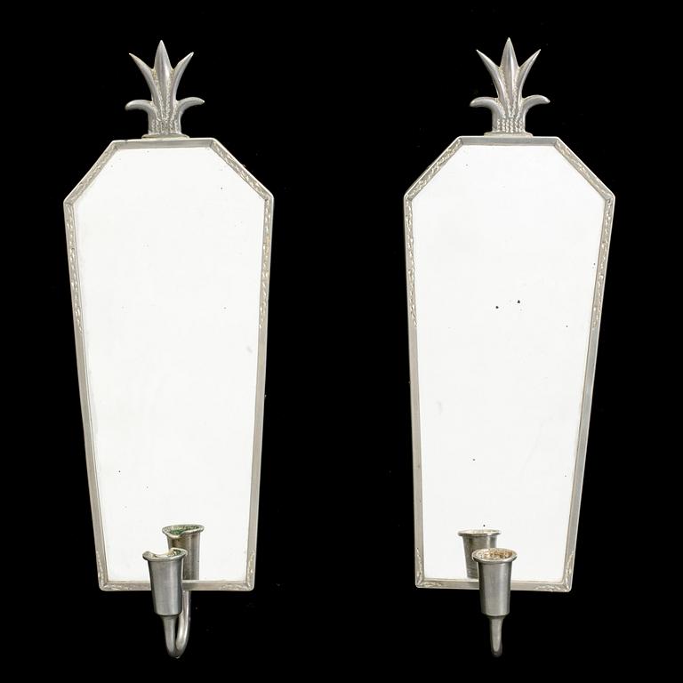 A pair of Art Deco mirror wall sconce from the 1930s.