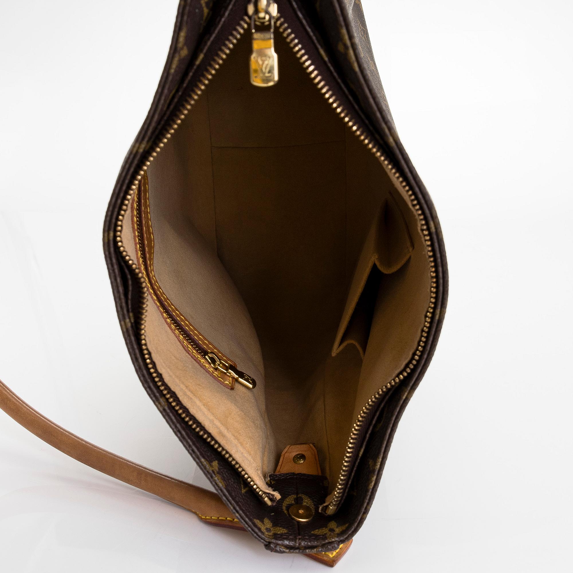 Louis Vuitton, a Monogram Canvas 'Looping GM' bag.