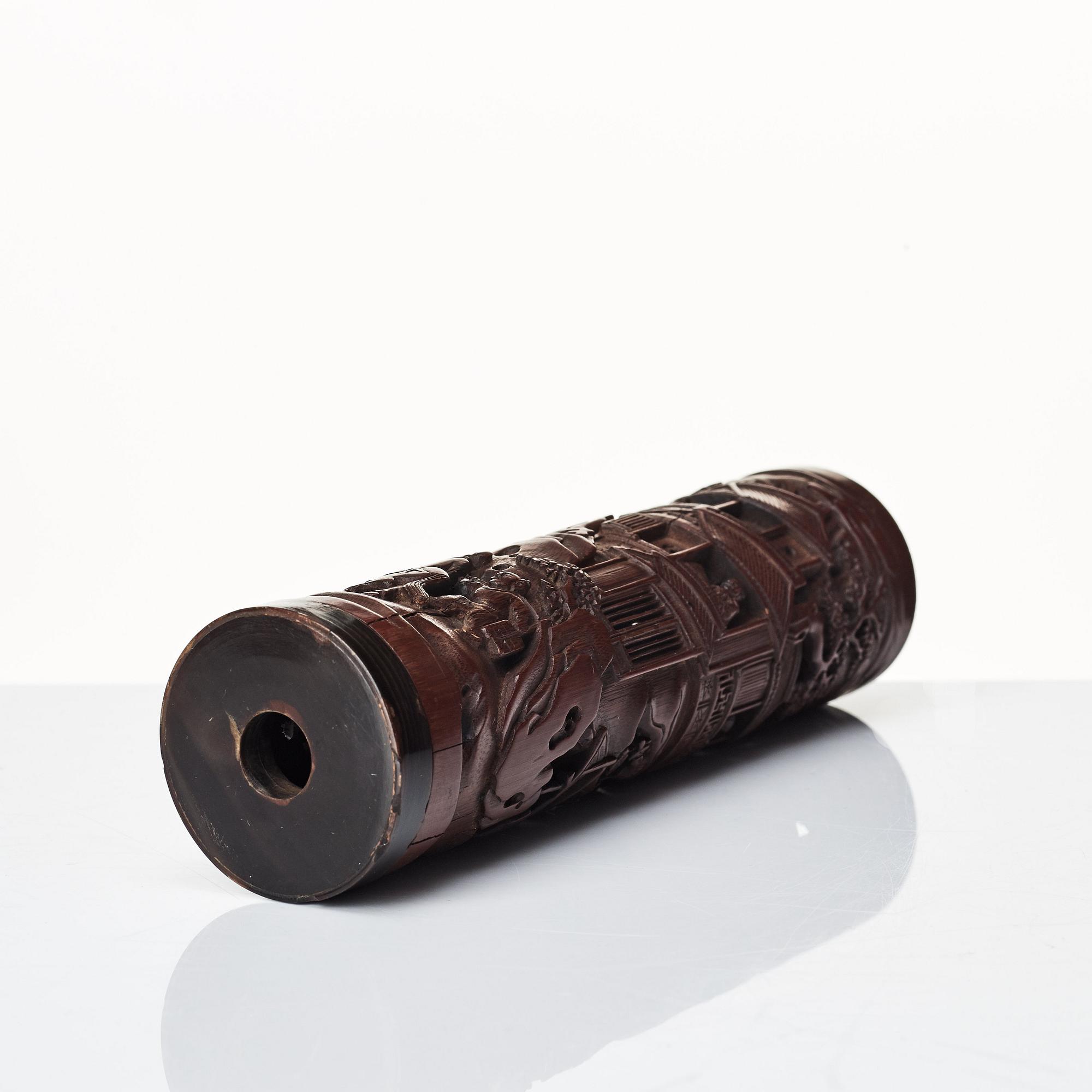 A carved cylindrical bambo parfumier, Qing dynasty, 19th Century.