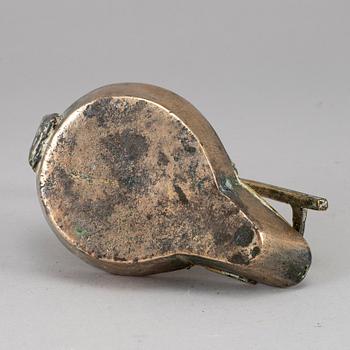 An 18th century bronze oil lamp.