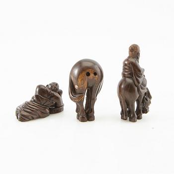 Netsuke, three pieces, boxwood. Japan, 20th century.