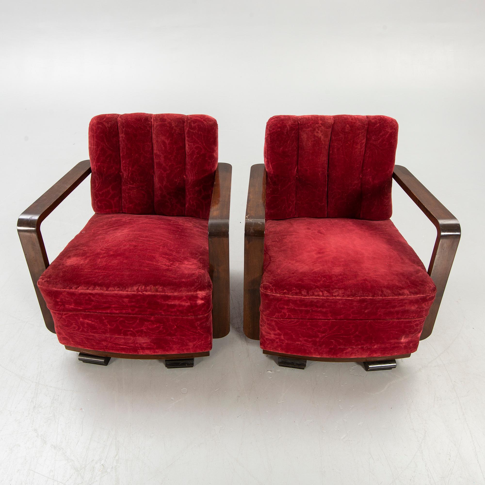 A pair of 1940s easy chairs.