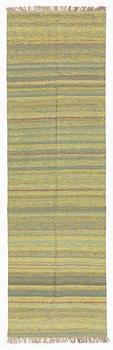 A kilim runner, 300 x 90 cm.
