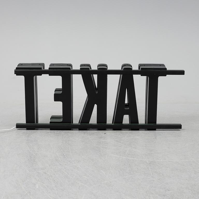 A neon sign "TAKET", late 20th century/21st century.