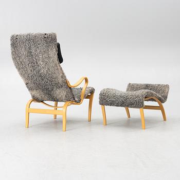 Bruno Mathsson, a 'Miranda' armchair and ottoman, Bruno Mathsson International, Värnamo, 2001.