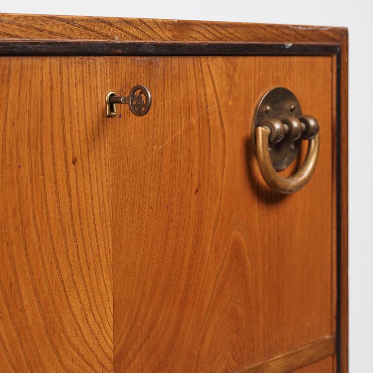 Otto Schulz, a Swedish Modern elm veneered drop front chest of drawers, Boet, 1940s.