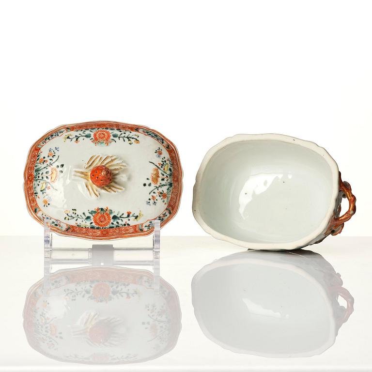 A famille rose butter tureen with cover and stand, Qing dynasty, 18th century.
