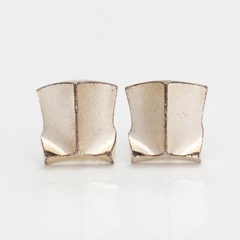 Lapponia, A necklace, bracelet and a pair of earrings made of sterling silver.
