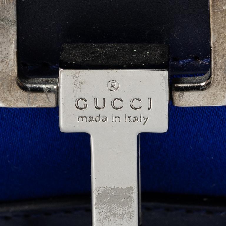 Gucci, a blue leather and fabric bag.