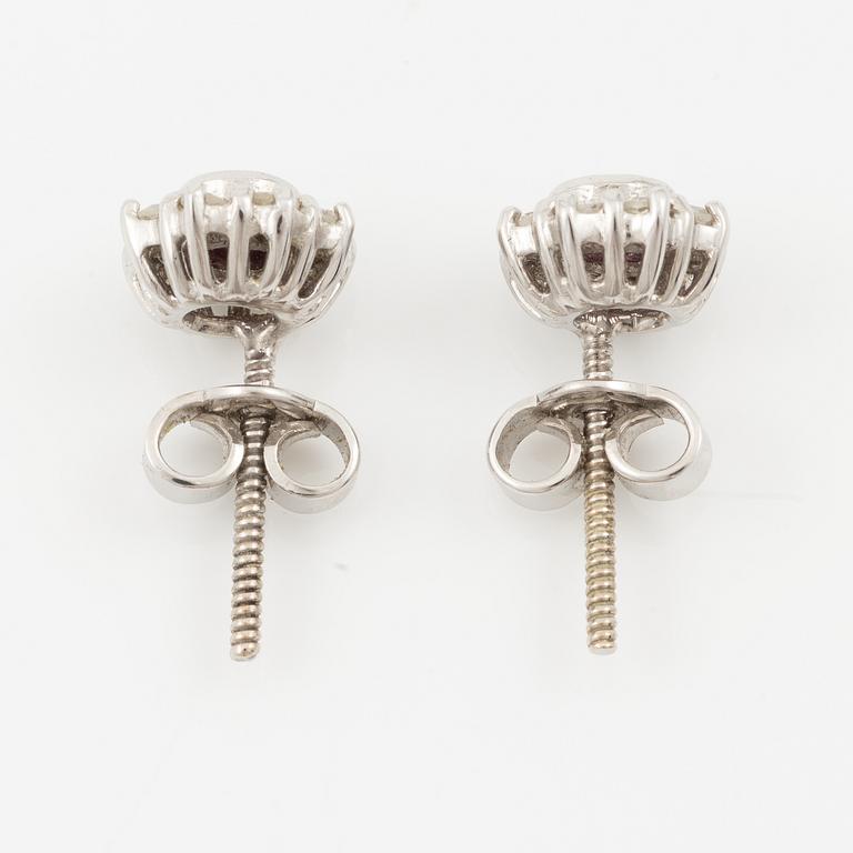 Pendant with gold chain, 
Pendant with white gold chain, 
Earrings a pair, rubies with brilliant-cut diamonds.