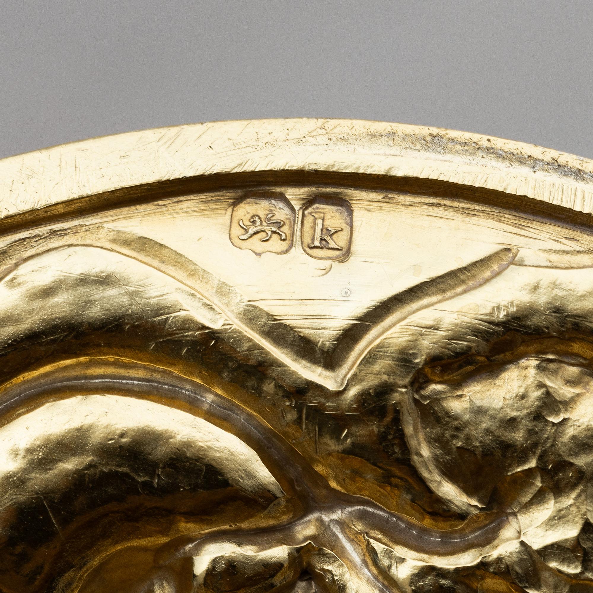 An English silver-gilt teapot with stand and burner, mark of Richard Sibley I, London 1825.