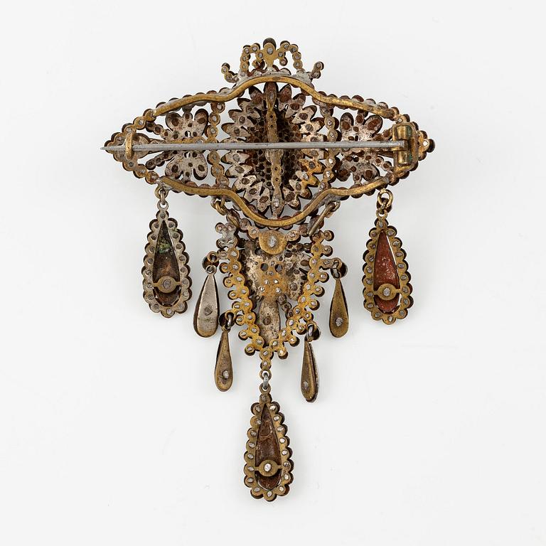 Demi parure, a pair of earrings, and a brooch, with so-called steel diamonds, 19th century.