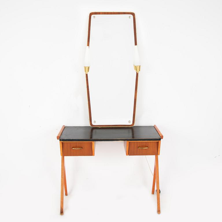 A 1950's dressing table with mirror.