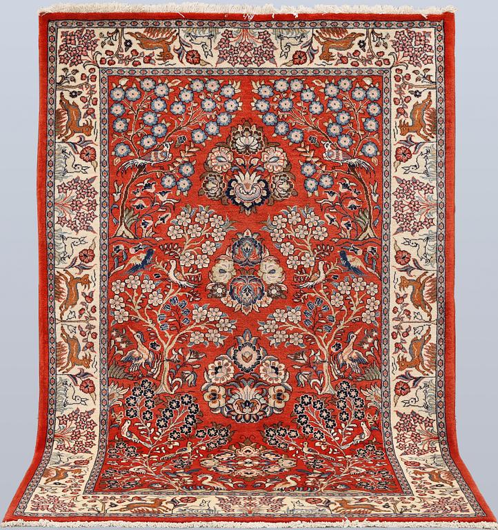 A Sarouk rug, approx. 212 x 140 cm.