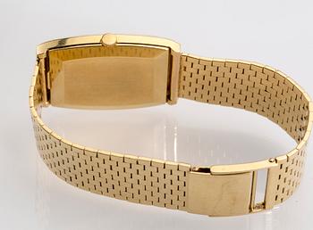 ARMBANDSUR, herr, Tissot, 18K guld. 1970-talets senare del. Vikt totalt ca 71 gram.