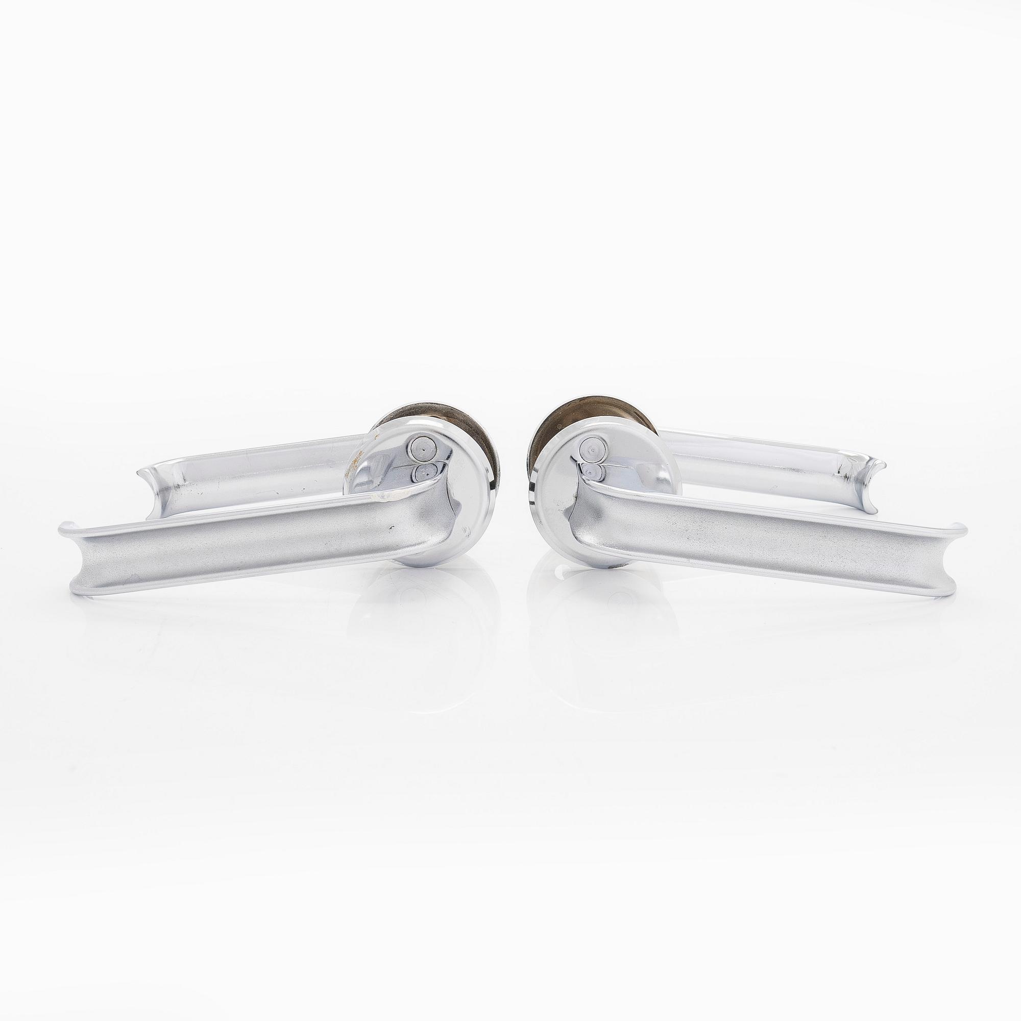 A set of six 1960s-1970s door handles.