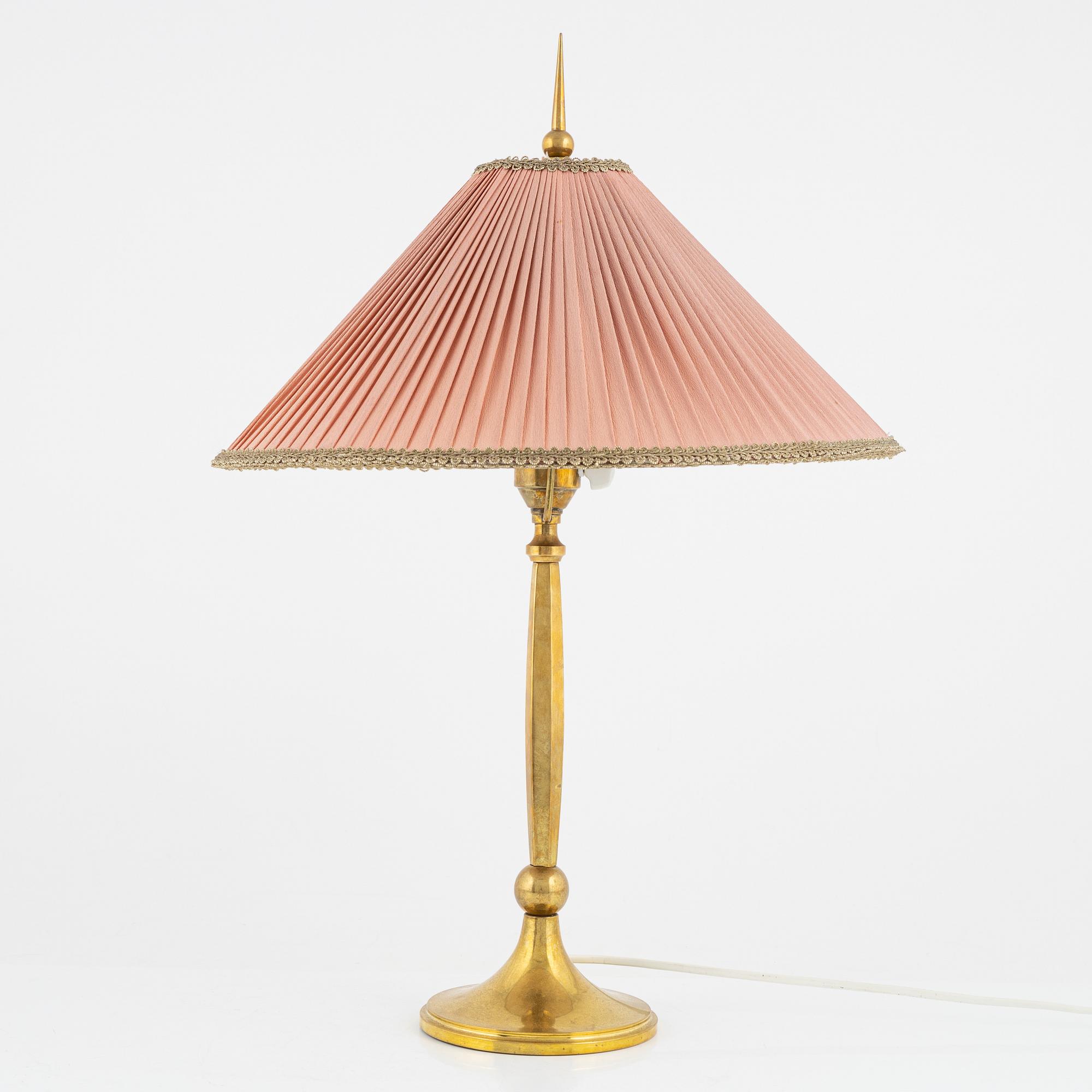 Harald Notini, a Swedish Grace '6851' brass table light, Arvid Böhlmarks Lampfabrik, Stockholm, 1920's.
