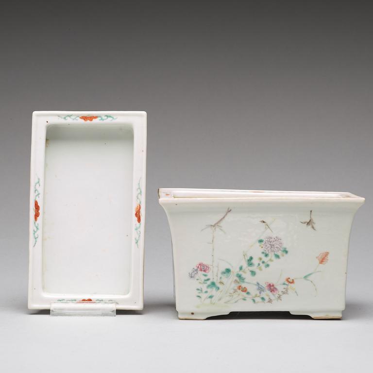 A famille rose flower pot with stand, Qing dynasty,  circa 1900.