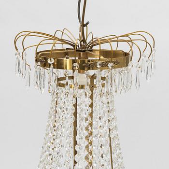 A contemporary Empire style chandelier for eight candles.