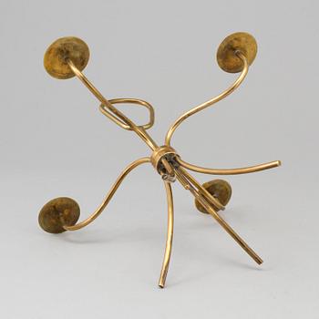 A brass candelabrum, mid 20th Century.