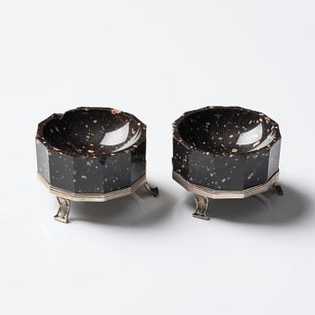 A pair of 'Lika-Risberg' porphyry Empire salts, Älvdalen, Sweden, early 19th century.