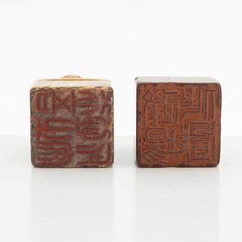 Two Chinese seals, in red and yellow stone.