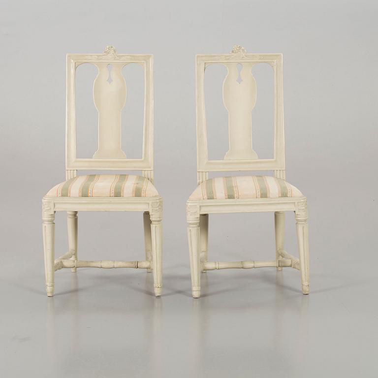 A piar of signed Swedish Gustavian chairs.