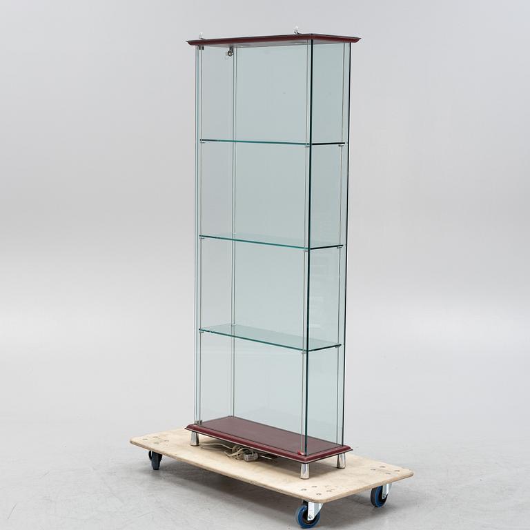 A glass display cabinet, Cattelan, Italy, 21st Century.