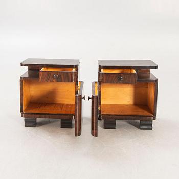 A pair of Art Deco 1940s walnut bedside talbes.